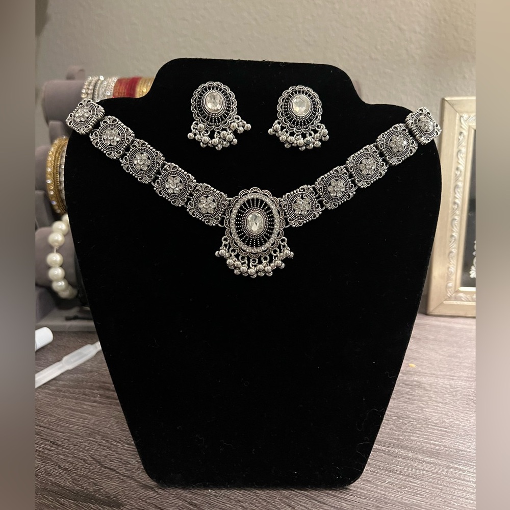 Silver necklace with earrings